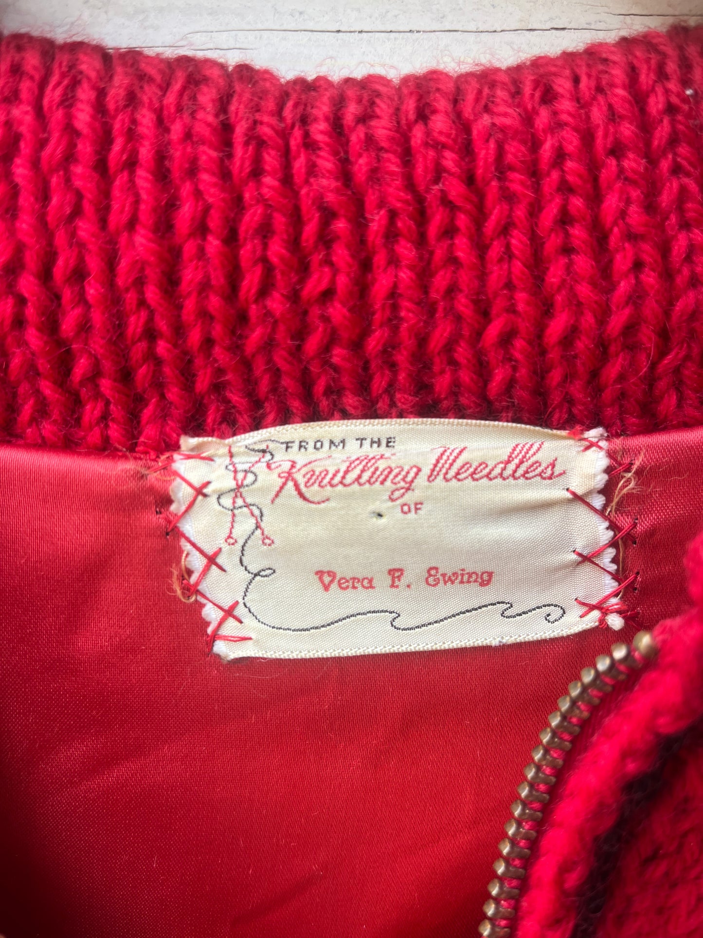 red knitted cardigan