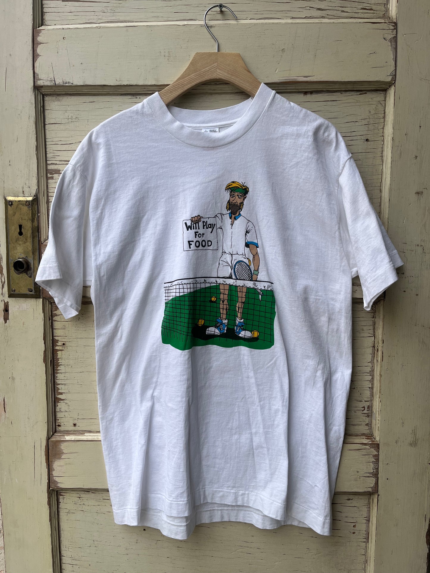 Tennis player "will play for food" tee